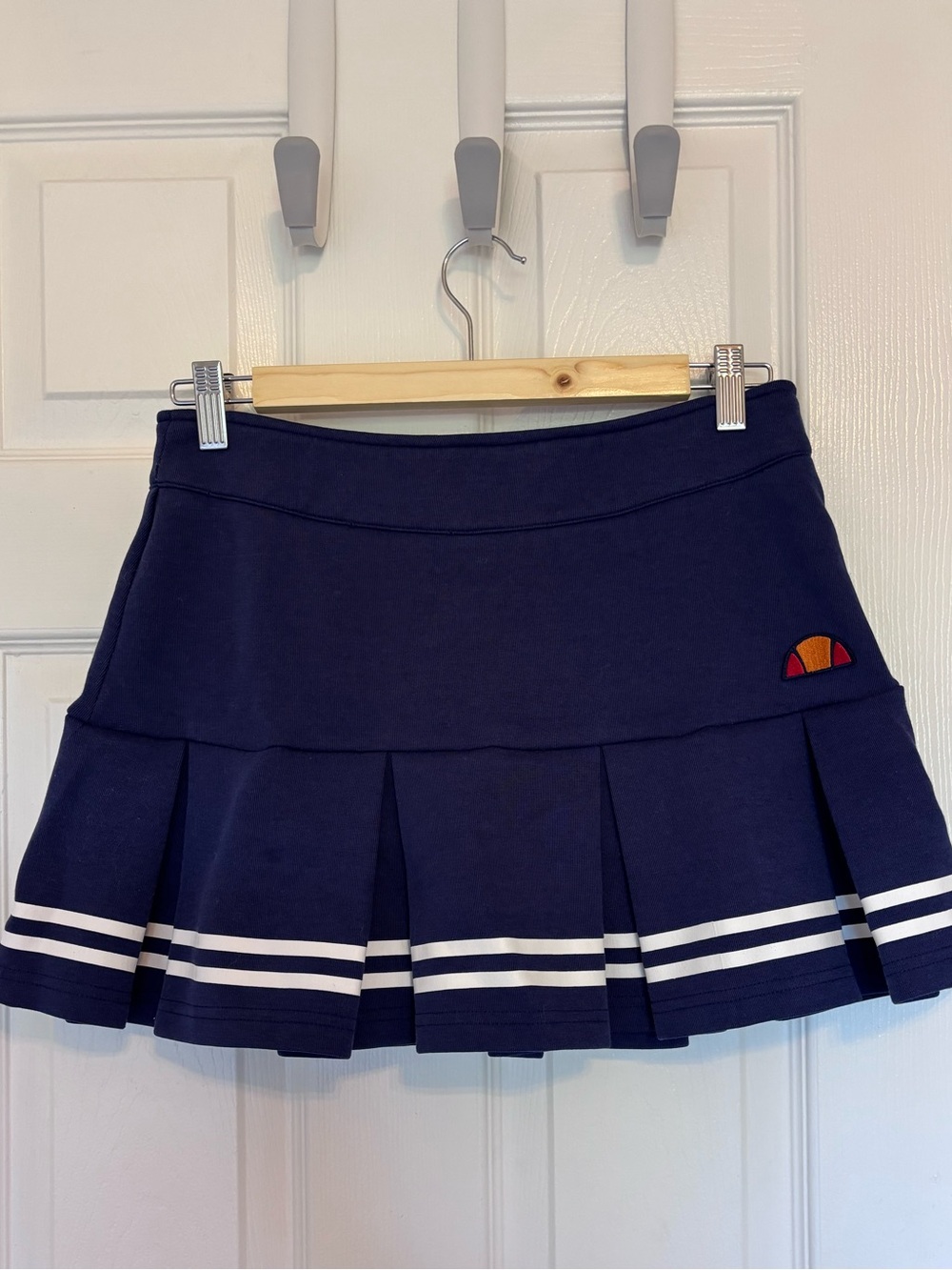 Ellesse Navy Pleated Mini Skirt with White Stripe Detail